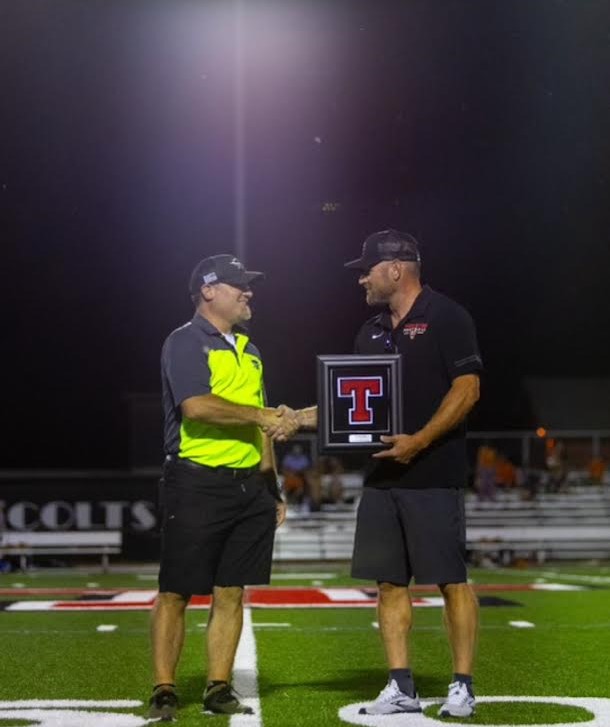 John Culp accepting an award for being a leader in his community